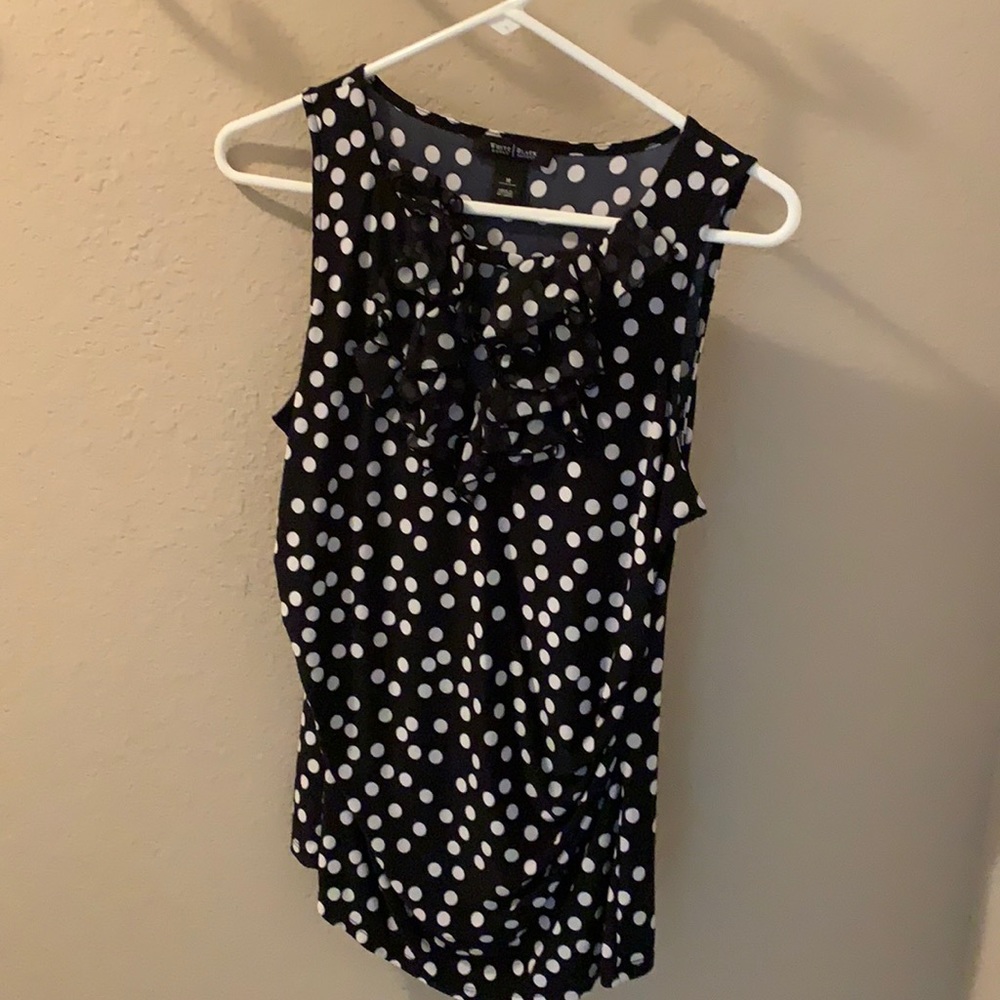 Women’s ruffled sleeveless top